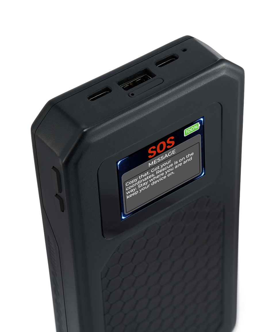 The device screen showing an SOS message reply, with the USB ports visible on the top edge.